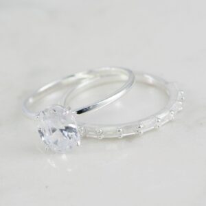 DUO DE ANILLOS CIRCON Y BAGUETTE